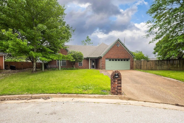 9669 Meadow Green Cv, Lakeland, TN 38002 - view of front of property with concrete driveway, brick siding, and a garage