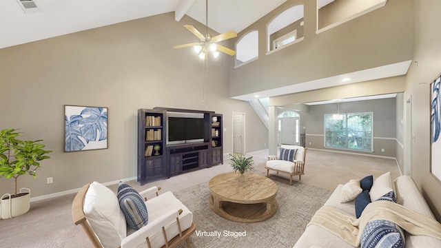 living area featuring carpet flooring, high vaulted ceiling, beam ceiling, a ceiling fan, and baseboards