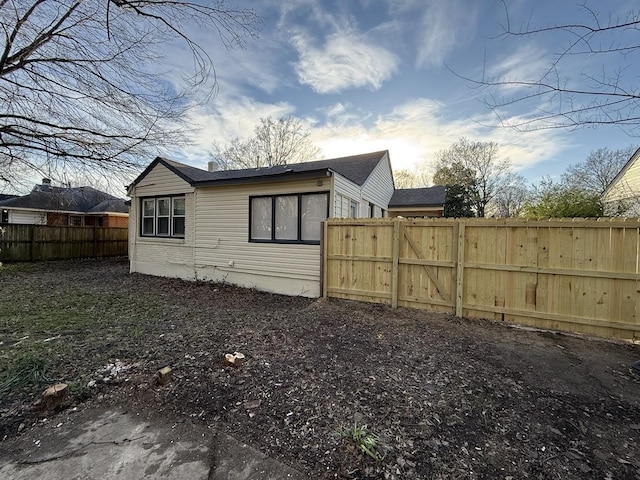 1340 S Perkins Rd, Memphis, TN 38117 - view of home's exterior with fence and a gate
