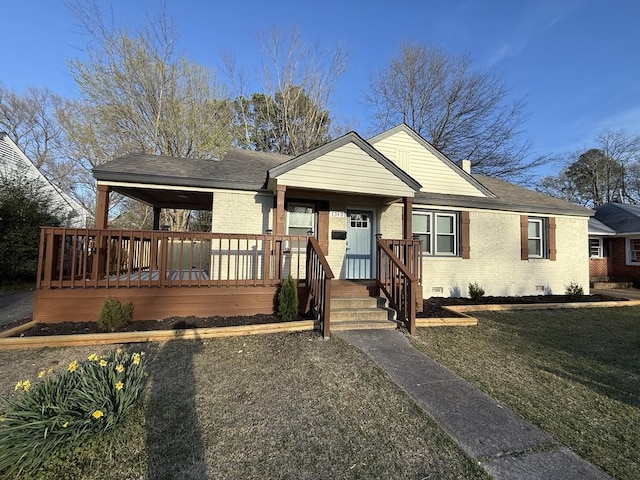 1340 S Perkins Rd, Memphis, TN 38117 - view of front of home featuring brick siding, a porch, a shingled roof, a front yard, and crawl space