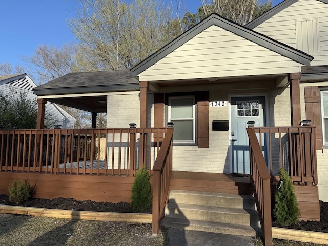1340 S Perkins Rd, Memphis, TN 38117 - view of front of home with brick siding and a deck