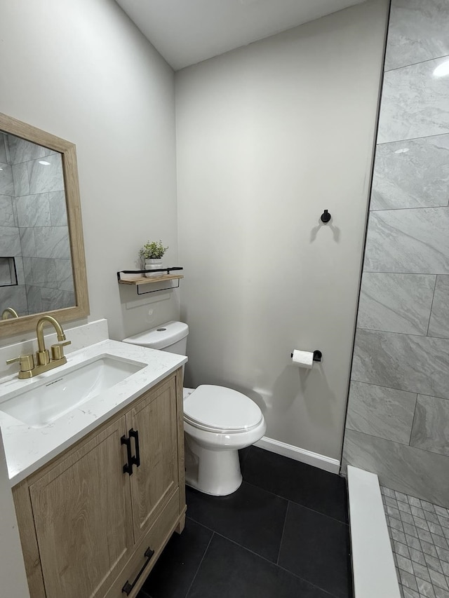 1340 S Perkins Rd, Memphis, TN 38117 - bathroom featuring toilet, vanity, tile patterned floors, and tiled shower