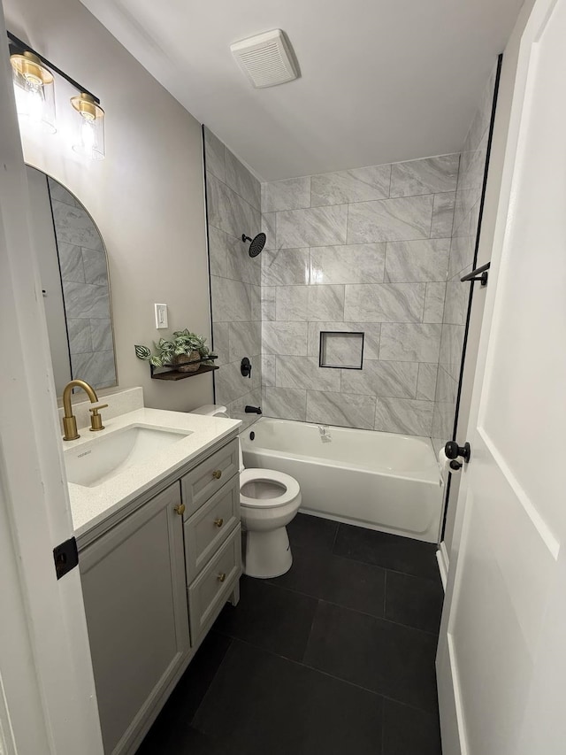 1340 S Perkins Rd, Memphis, TN 38117 - full bath featuring tile patterned floors, vanity, toilet, and  shower combination