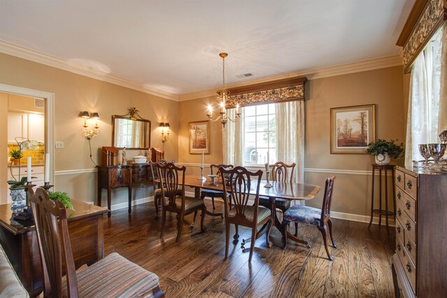 dining space with dark wood finished floors, a chandelier, baseboards, and crown molding