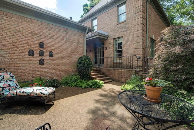 back of property with brick siding