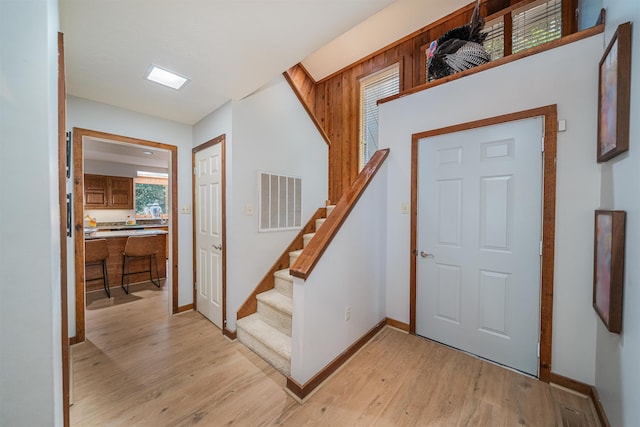 150 Island View Dr, Counce, TN 38326 - foyer with light wood-style flooring, stairs, and baseboards