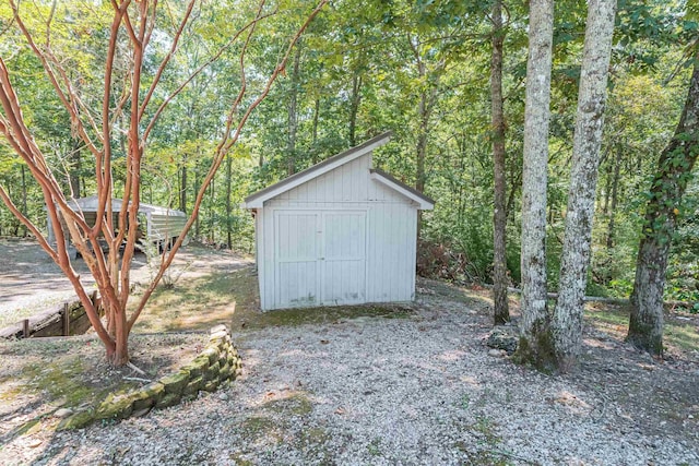 150 Island View Dr, Counce, TN 38326 - view of shed featuring a wooded view