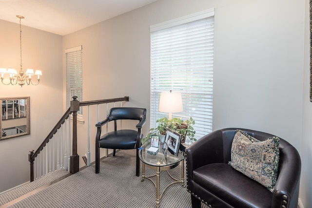 6932 Midhurst Rd Unit 6932, Memphis, TN 38119 - living area featuring a chandelier, carpet floors, plenty of natural light, and an upstairs landing