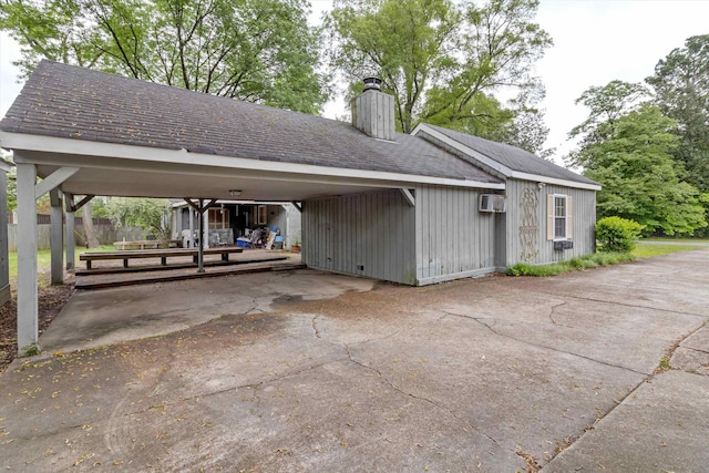 4948 Roane Rd, Memphis, TN 38117 - view of patio with fence, a wall mounted AC, and driveway
