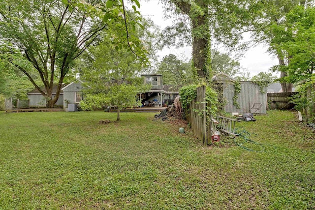 4948 Roane Rd, Memphis, TN 38117 - view of yard featuring an outdoor structure and a storage unit