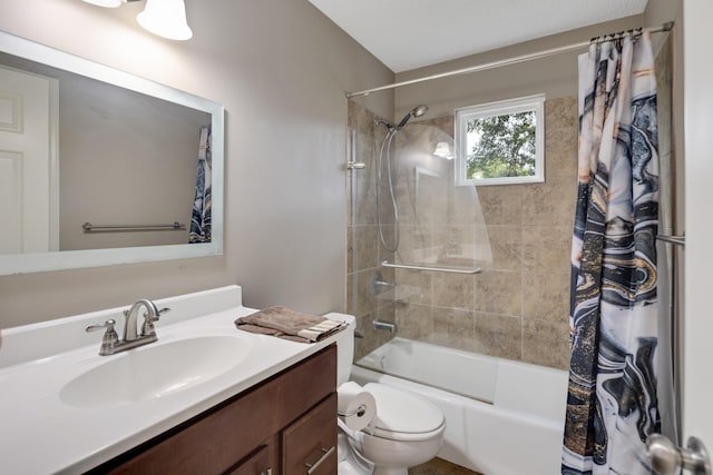 bathroom featuring shower / bath combo, vanity, and toilet
