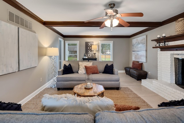 living area featuring a fireplace, a ceiling fan, ornamental molding, beamed ceiling, and baseboards