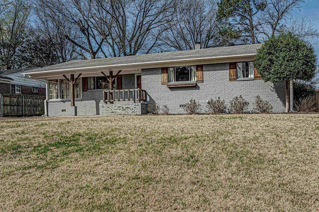 151 N White Station Rd, Memphis, TN 38117 - ranch-style house with brick siding, a porch, and a chimney