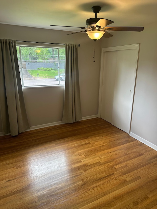 151 N White Station Rd, Memphis, TN 38117 - empty room featuring ceiling fan, wood finished floors, and baseboards