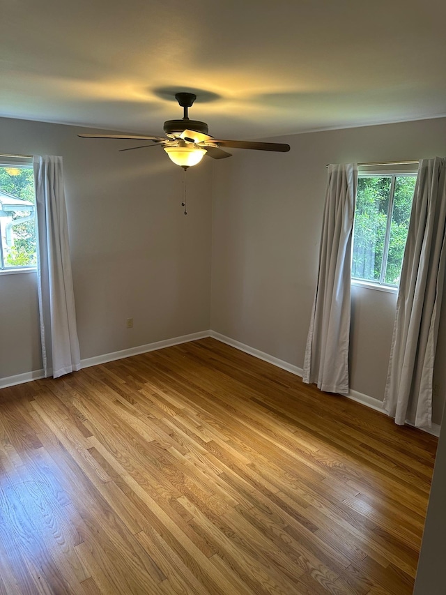 151 N White Station Rd, Memphis, TN 38117 - unfurnished room featuring ceiling fan, light wood-style floors, and baseboards