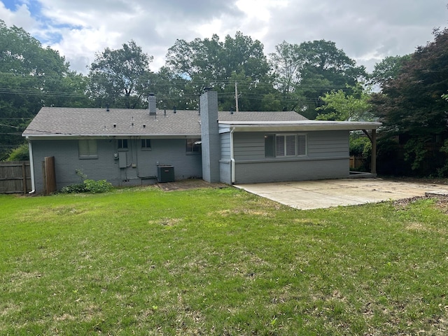 151 N White Station Rd, Memphis, TN 38117 - back of property featuring a chimney, a patio, brick siding, and cooling unit