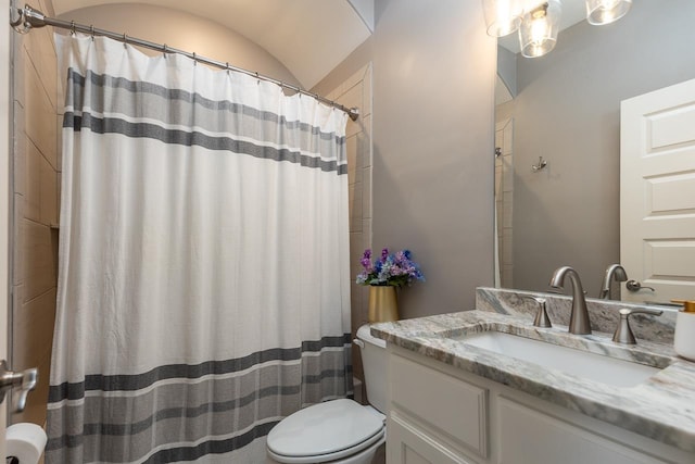 bathroom with vanity, toilet, and a shower with shower curtain