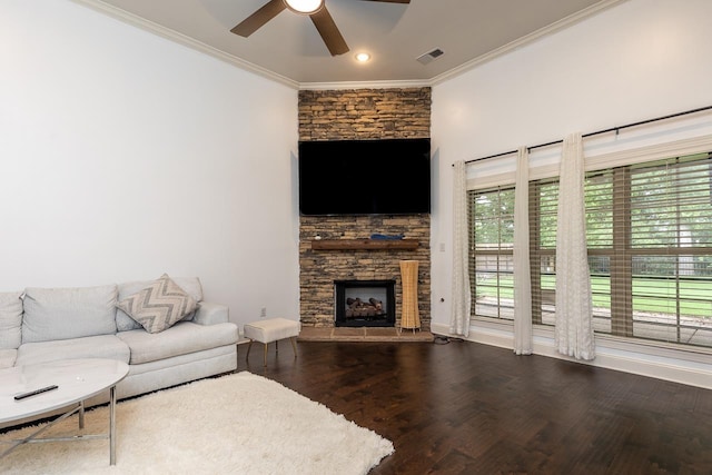 living room with crown molding, ceiling fan, wood finished floors, a fireplace, and recessed lighting