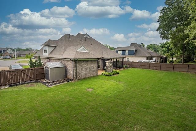 view of yard featuring a storage unit and an outdoor structure