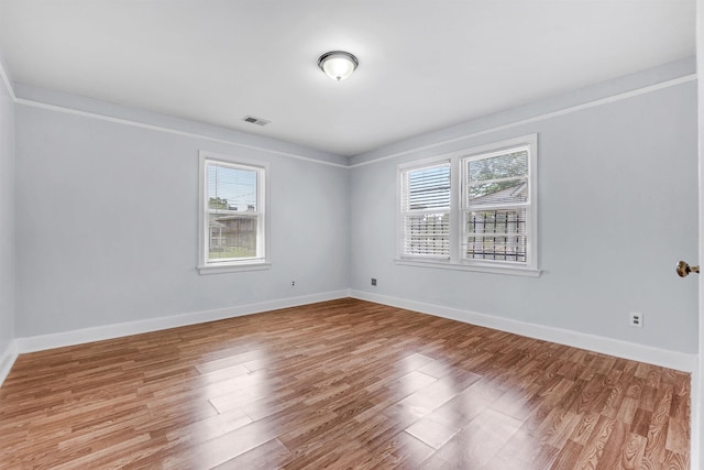 686 Looney Ave, Memphis, TN 38107 - unfurnished room with wood finished floors and baseboards
