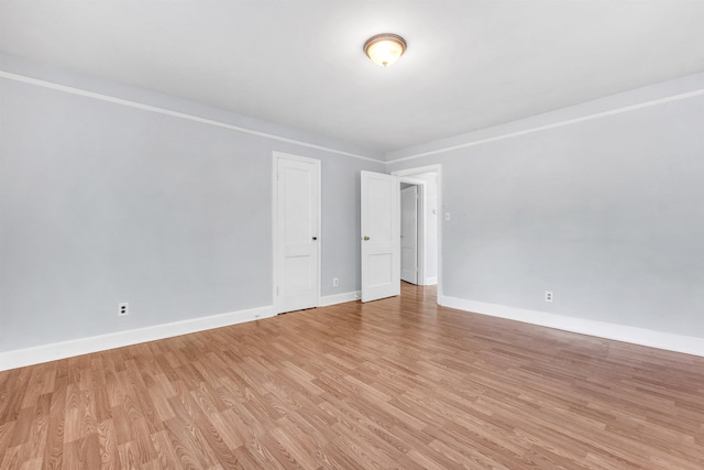 686 Looney Ave, Memphis, TN 38107 - unfurnished room with light wood finished floors and baseboards