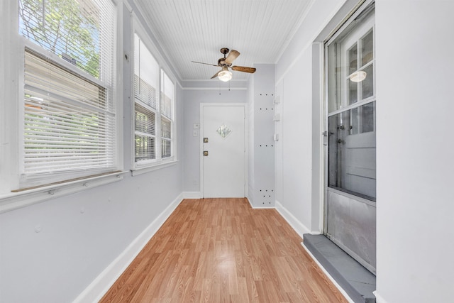 686 Looney Ave, Memphis, TN 38107 - doorway to outside featuring light wood-type flooring, ceiling fan, crown molding, and baseboards