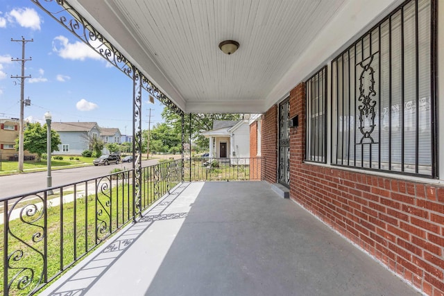 686 Looney Ave, Memphis, TN 38107 - view of patio featuring covered porch and a residential view