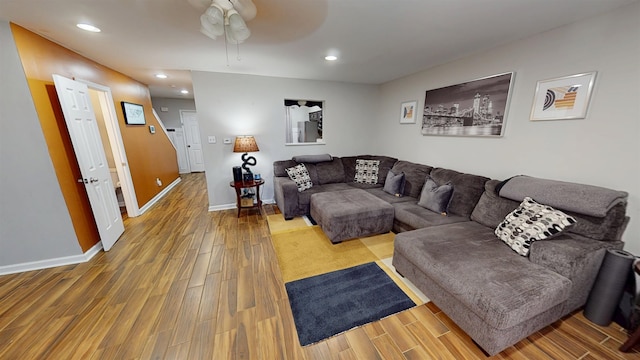 living room with wood finished floors, ceiling fan, recessed lighting, and baseboards