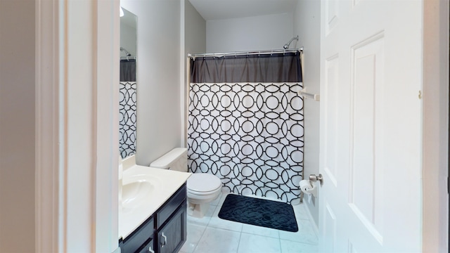 bathroom featuring vanity, toilet, curtained shower, and tile patterned flooring