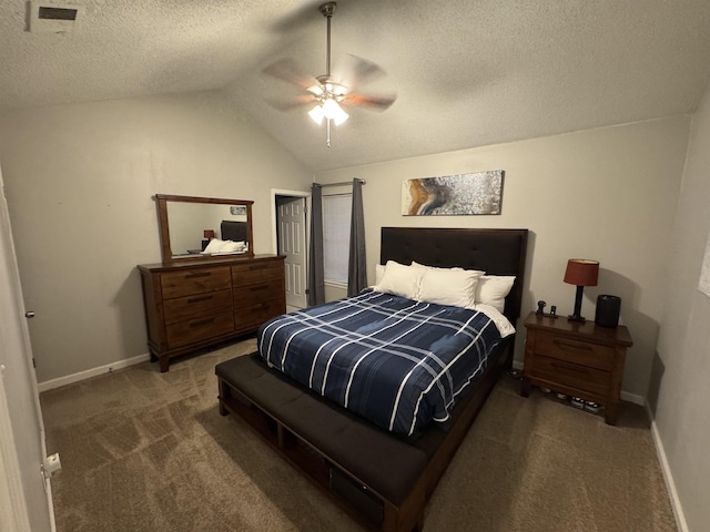 bedroom with carpet flooring, lofted ceiling, baseboards, a textured ceiling, and a ceiling fan