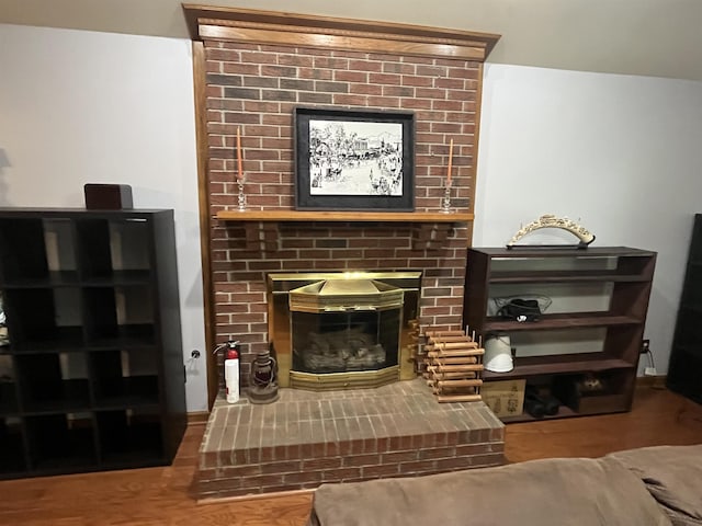 8130 Julie Cv, Millington, TN 38053 - sitting room with a fireplace and wood finished floors