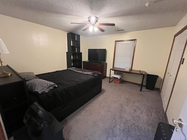 8130 Julie Cv, Millington, TN 38053 - bedroom featuring a ceiling fan, carpet, and a textured ceiling