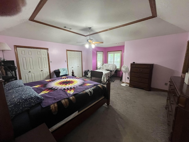 8130 Julie Cv, Millington, TN 38053 - bedroom featuring carpet flooring, a tray ceiling, a ceiling fan, a textured ceiling, and vaulted ceiling
