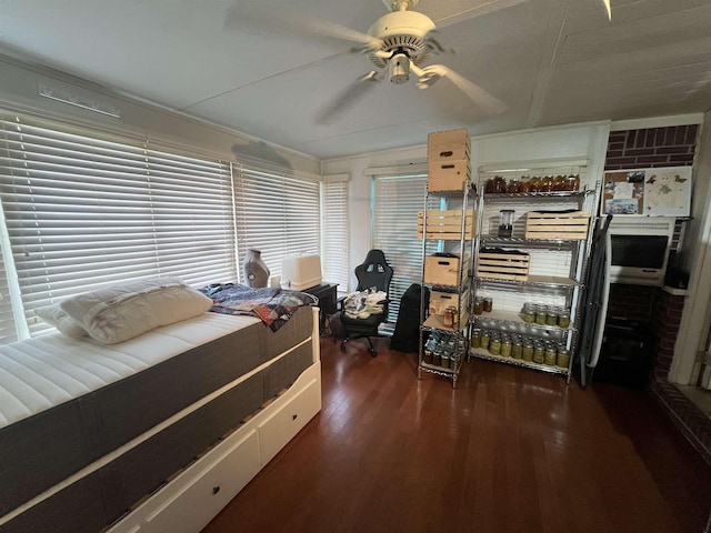 8130 Julie Cv, Millington, TN 38053 - bedroom with wood finished floors and a ceiling fan