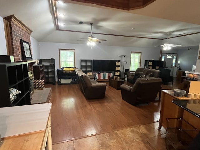 8130 Julie Cv, Millington, TN 38053 - living area featuring ceiling fan, plenty of natural light, vaulted ceiling, and wood finished floors