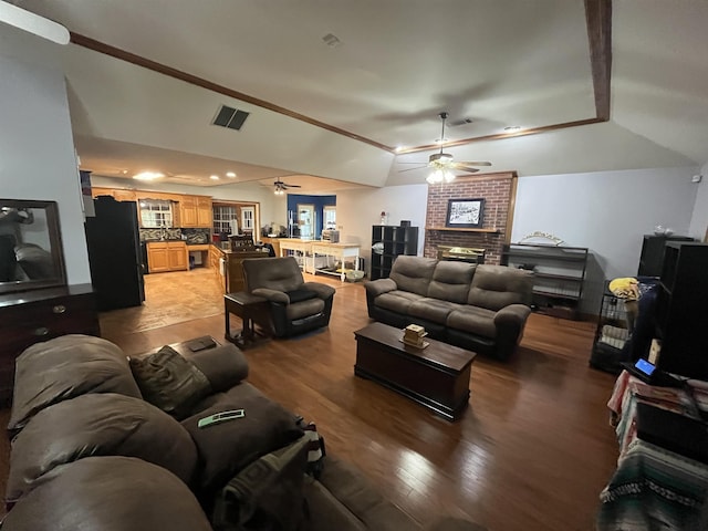 8130 Julie Cv, Millington, TN 38053 - living area featuring a ceiling fan, a brick fireplace, light wood-style floors, and crown molding