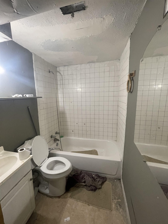 3766 Orchi Rd, Memphis, TN 38108 - bathroom featuring  shower combination, toilet, a textured ceiling, and vanity