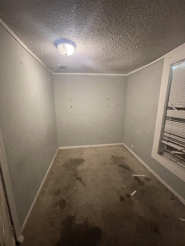3766 Orchi Rd, Memphis, TN 38108 - empty room featuring a textured ceiling and baseboards