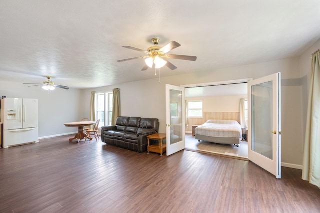living room featuring french doors, ceiling fan, dark wood-style flooring, and baseboards