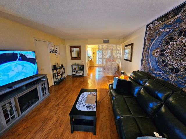 1212 Bristol Dr Unit 1212, Memphis, TN 38119 - living room with wood finished floors and a textured ceiling