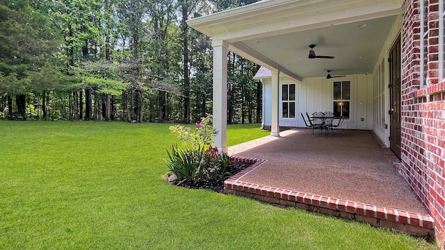 335 Blain St, Rossville, TN 38066 - view of green lawn with a ceiling fan and a patio area