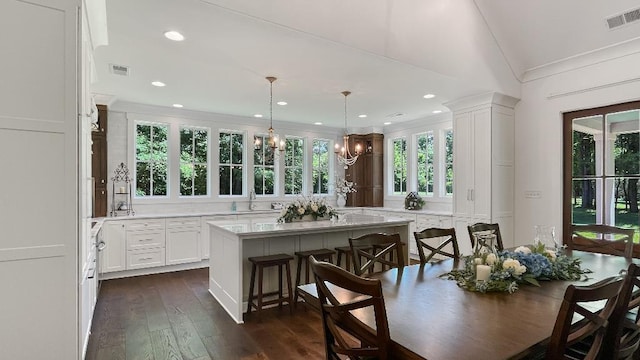 335 Blain St, Rossville, TN 38066 - kitchen featuring a chandelier, healthy amount of natural light, light countertops, crown molding, and recessed lighting