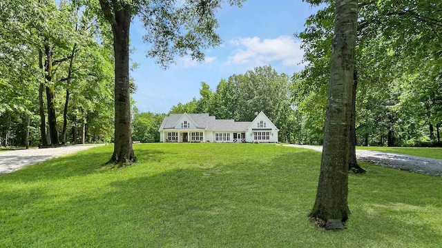 335 Blain St, Rossville, TN 38066 - view of front of house featuring a front yard and gravel driveway