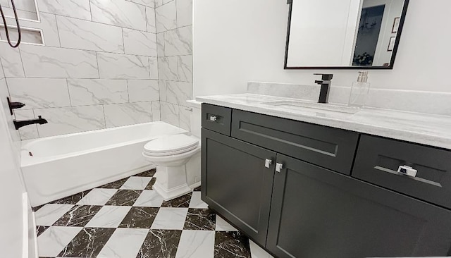 335 Blain St, Rossville, TN 38066 - full bath featuring toilet, vanity, washtub / shower combination, and marble look tiles