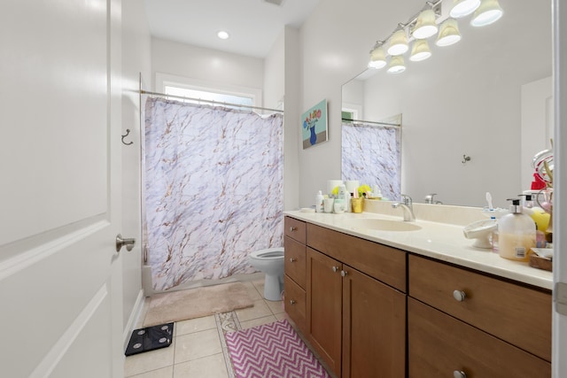 bathroom featuring toilet, tile patterned flooring, vanity, and shower / bath combo with shower curtain