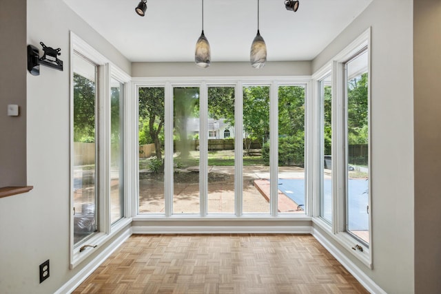 5305 Brantford Ave, Memphis, TN 38120 - unfurnished sunroom with healthy amount of natural light and baseboards
