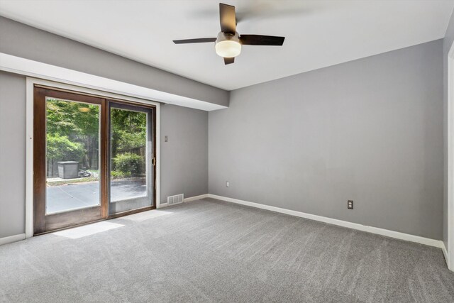 5305 Brantford Ave, Memphis, TN 38120 - empty room featuring carpet, ceiling fan, and baseboards