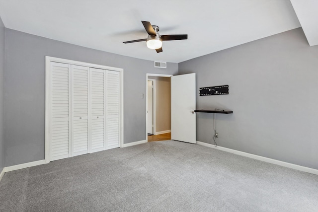 5305 Brantford Ave, Memphis, TN 38120 - unfurnished bedroom featuring a closet, baseboards, carpet floors, and ceiling fan