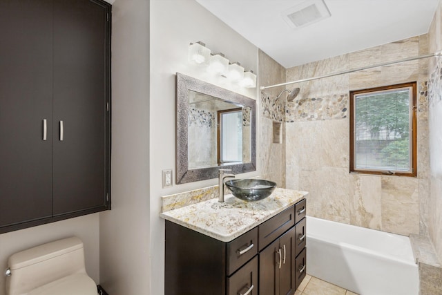 5305 Brantford Ave, Memphis, TN 38120 - full bathroom with toilet, vanity, shower / washtub combination, and tile patterned floors
