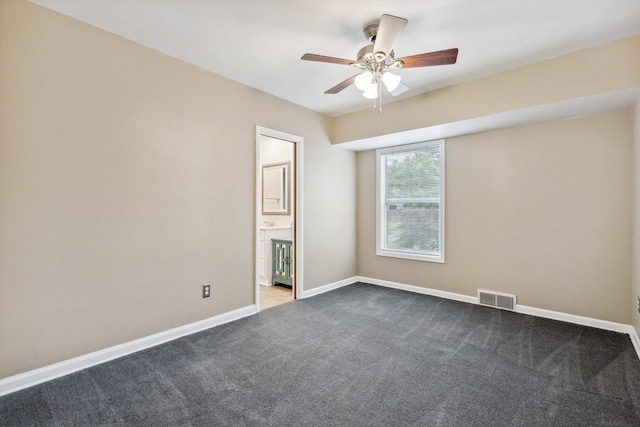 5305 Brantford Ave, Memphis, TN 38120 - unfurnished room featuring dark colored carpet, a ceiling fan, and baseboards